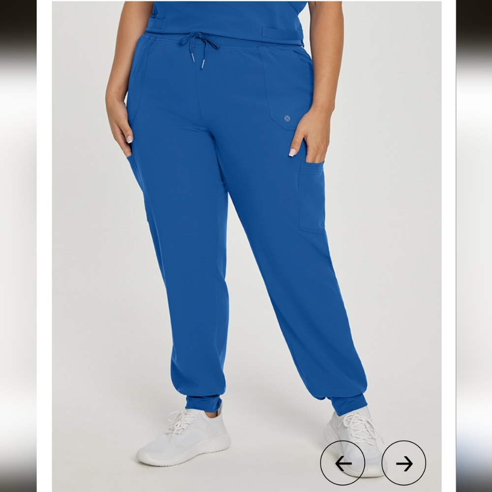 White cross scrub pants